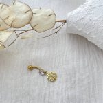 پیرسینگ ناف با آویز برگ پاییزی استیل